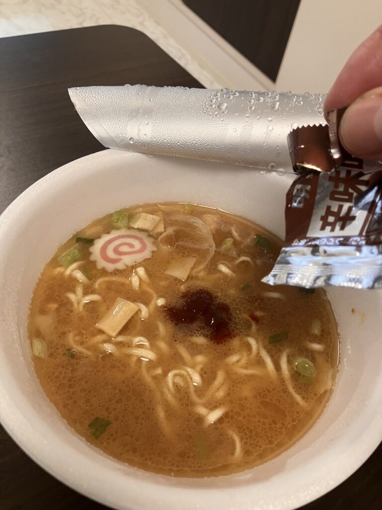 A photo of the miso paste being added, as it is the main topping