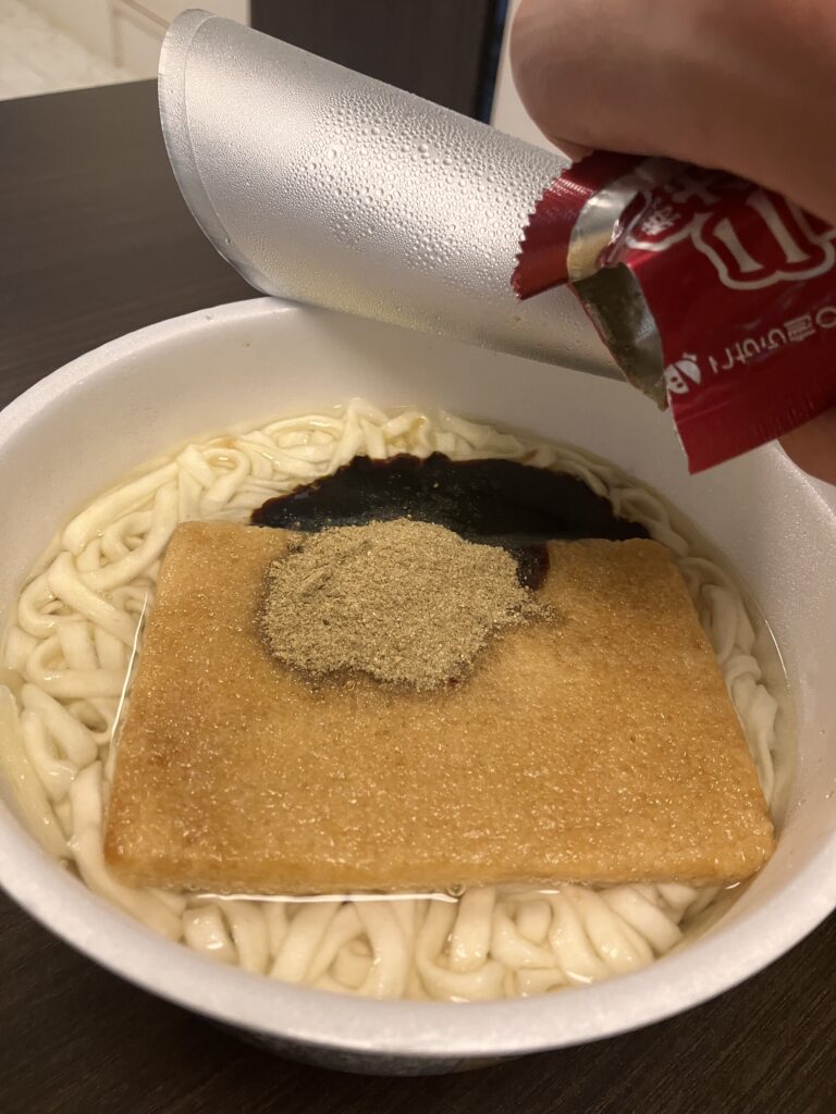 Photo of the finished cup ramen with all the toppings added